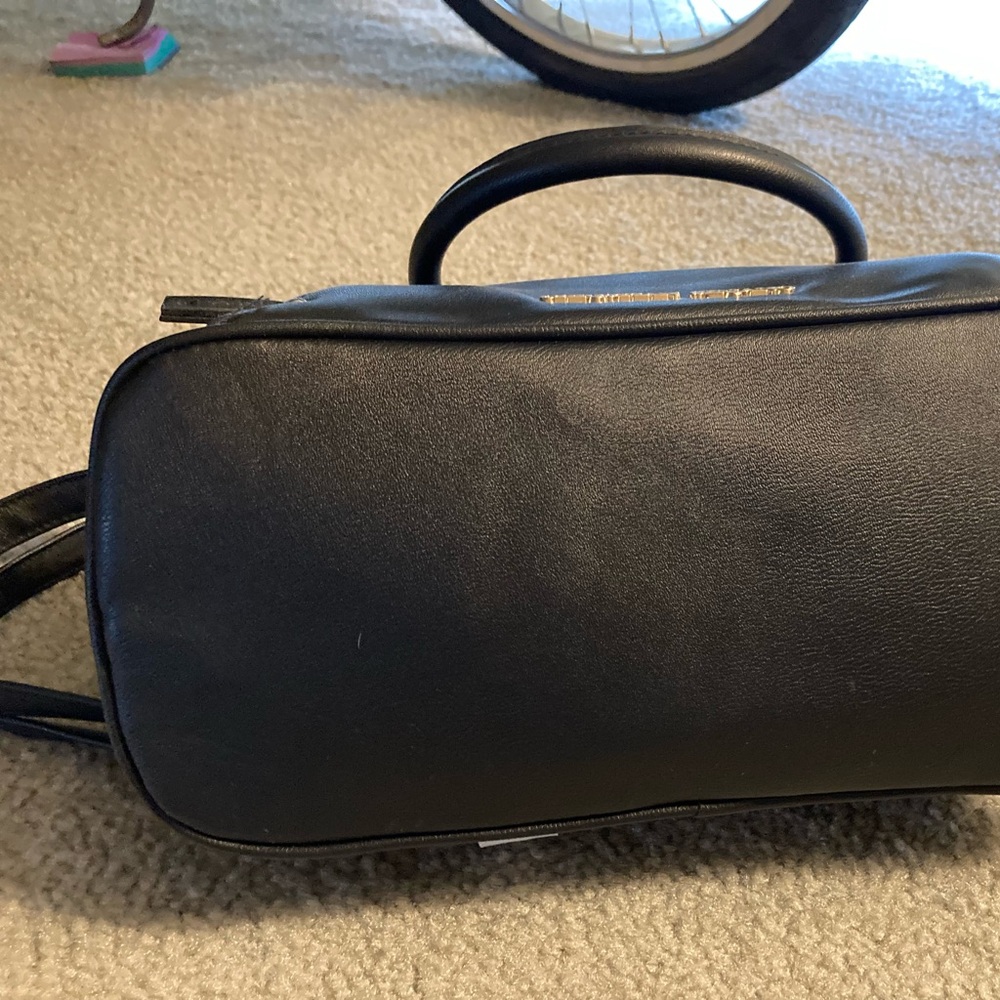 Black handbag with crossbody handles and hand straps. - Picture 5 of 5